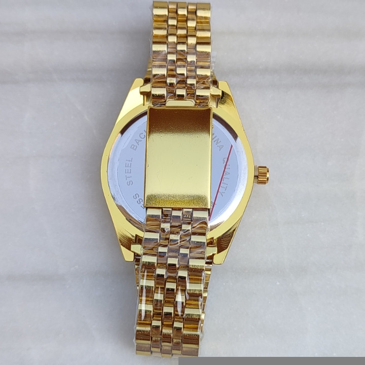 ساعت مردانه بند فلزی طلایی