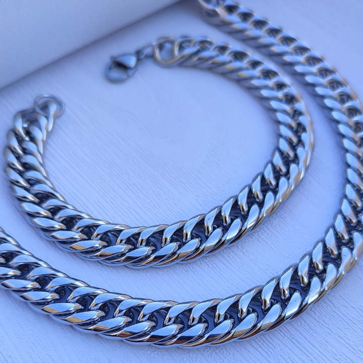 خرید ست گردنبند و دستبند مردانه نقره ای کارتیر رنگ ثابت