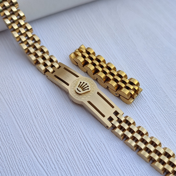 خرید ست انگشتر و دستبند پسرانه طلایی استیل رنگ ثابت