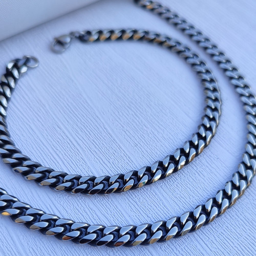 خرید گردنبند دستبند مردانه سیاه قلم استیل رنگ ثابت