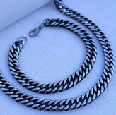 خرید گردنبند و دستبند مردانه سیاه قلم استیل رنگ ثابت