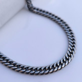 خرید زنجیر مردانه کارتیر سیاه قلم استیل رنگ ثابت