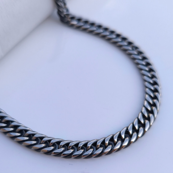 خرید زنجیر مردانه کارتیر سیاه قلم استیل رنگ ثابت