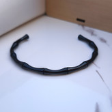 خرید دستبند مردانه مشکی طرح بامبو استیل رنگ ثابت