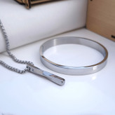 خرید ست گردنبند و دستبند مردانه نقره ای استیل رنگ ثابت