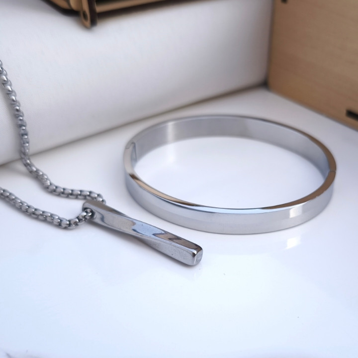 خرید ست گردنبند و دستبند مردانه نقره ای استیل رنگ ثابت