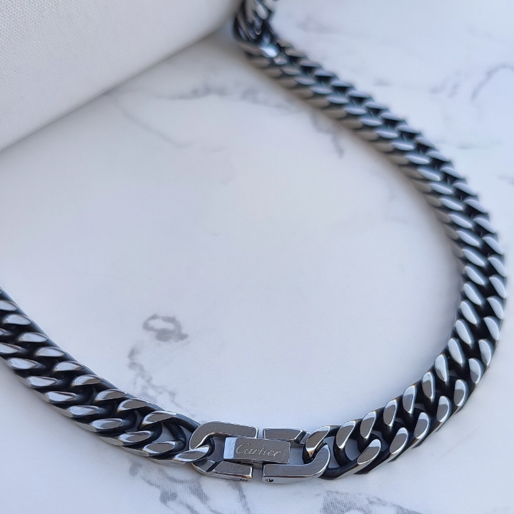 خرید زنجیر سیاه قلم مردانه قفل کارتیر استیل رنگ ثابت