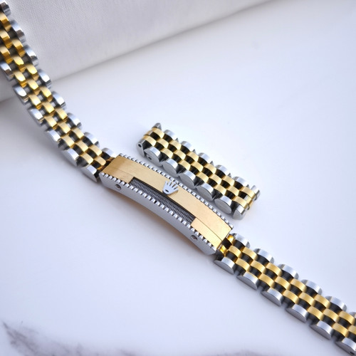 خرید دستبند انگشتر مردانه طلایی نقره ای استیل رولکس رنگ ثابت