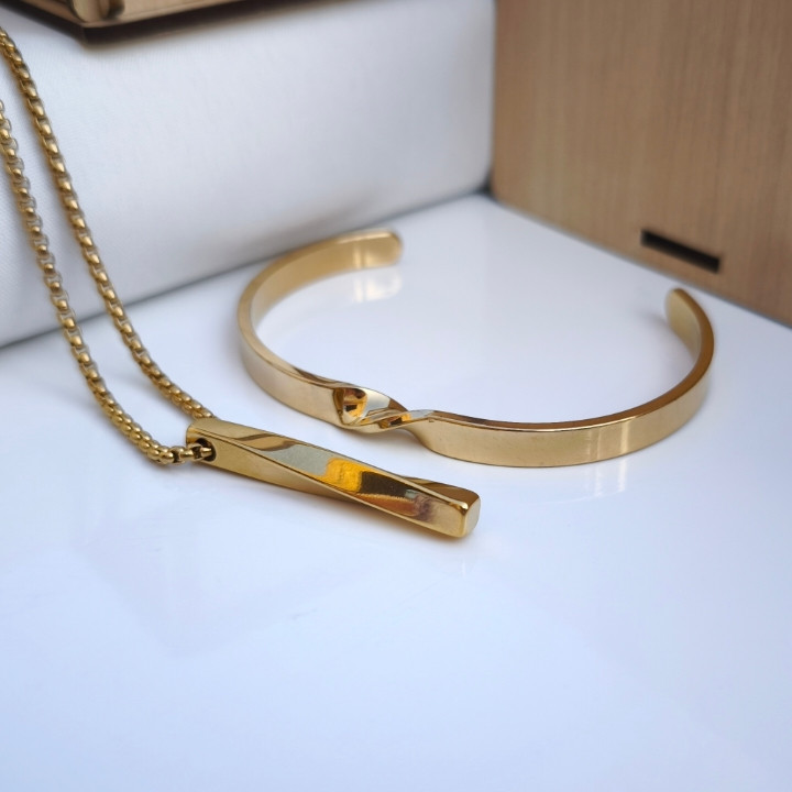 خرید ست گردنبند و بنگل پسرانه طرح پیچ طلایی رنگ ثابت ارزان شیک